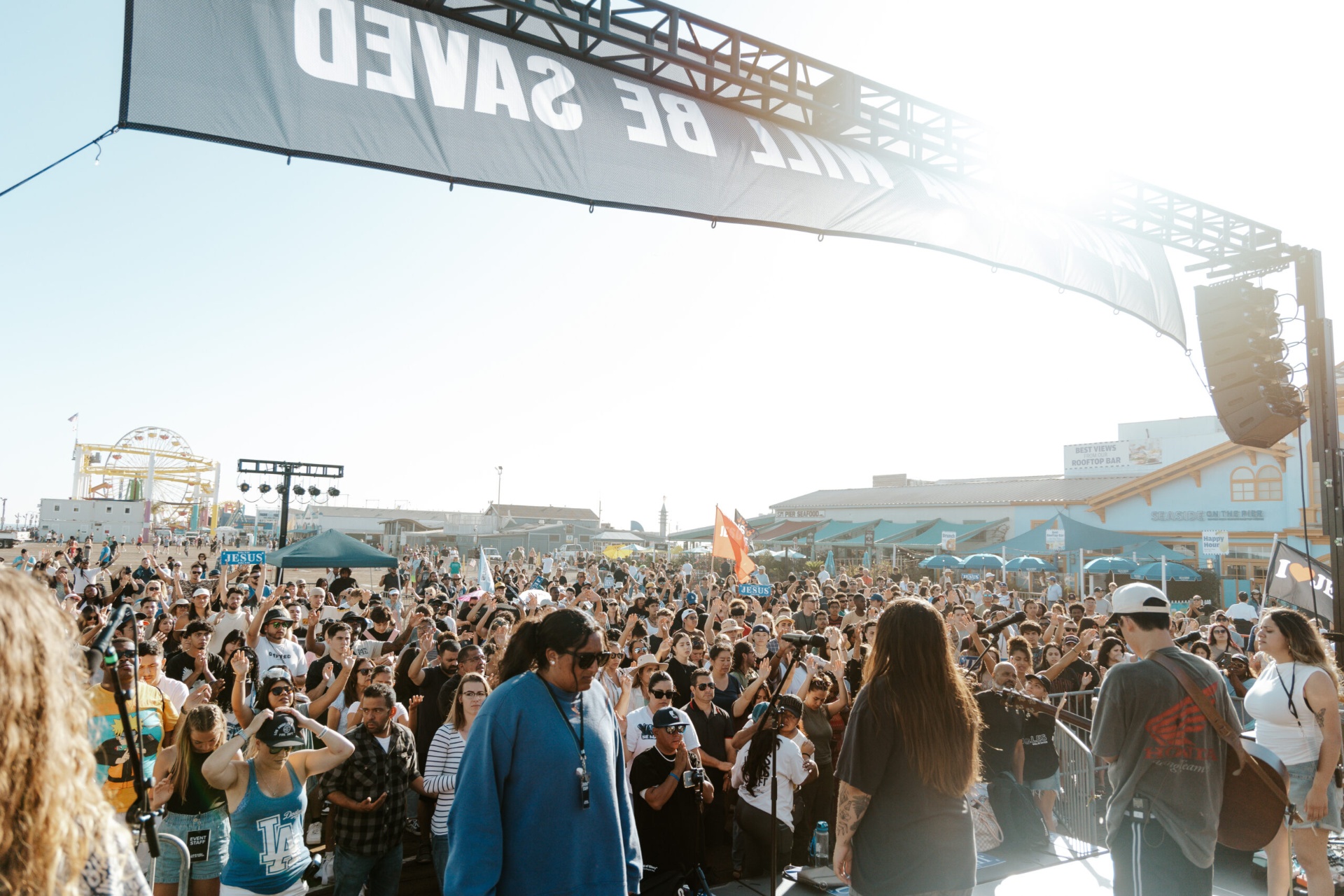 Crowd worshipping at California Will Be Saved on Santa Monica Pier